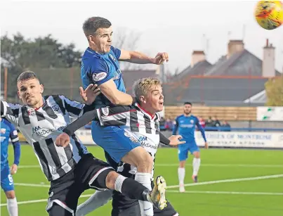  ?? Picture: Phoenix Photograph­y. ?? Jamie Redman clears for Montrose, who kept another clean sheet as they saw off Elgin.