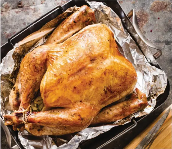  ?? DANIEL J. VAN ACKERE — AMERICA’S TEST KITCHEN VIA AP ?? A roast turkey