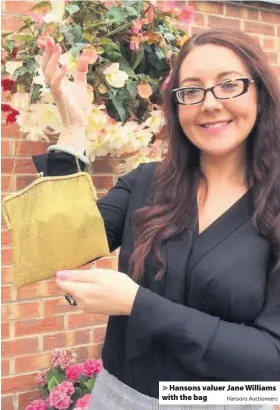  ?? Hansons Auctioneer­s ?? &gt; Hansons valuer Jane Williams with the bag