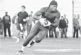  ?? AP FILE PHOTO ?? The Dolphins took big, strong Boise State running back Jay Ajayi in the fifth round.