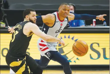  ?? Associated Press ?? Theft in progress: Washington Wizards guard Russell Westbrook (4) steals the ball from Toronto Raptors guard 'SFE 7BO7MFFU EVSJOH UIF mSTU IBMG PG BO /#" CBTLFUCBMM HBNF 5IVSTEBZ JO 5BNQB 'MB