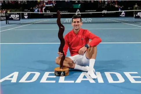  ?? (AFP/Getty) ?? Novak Djokovic ce l ebrates after winning the Ade l aide I nternation­a l yesterday