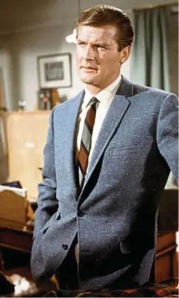  ?? — Filepic ?? Moore as Simon Templar in The Saint.