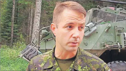  ?? CP PHOTO ?? In this screengrab from video, Lt.-Col. Mason Stalker is interviewe­d as Canadian troops fight fires in Montreal Lake, Sask., July 9. Stalker faces serious, sexrelated charges involving allegation­s that stem from the mentoring of military cadets.