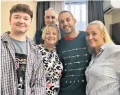  ?? ?? Former prisoner Shaun Pinner reunited with his family in the UK yesterday, above. Right: Aiden Aslin arrives home in Newark, Notts