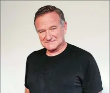  ?? DAN STEINBERG/INVISION/AP, FILE ?? In this Nov. 5, 2011, file photo Robin Williams poses for a portrait during a “Happy Feet” press junket in Beverly Hills, Calif.