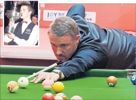  ??  ?? It is now 21 years since Stephen Hendry, here back among the balls playing pool, last lifted the world title at the Crucible (inset)