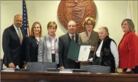  ?? PETE BANNAN — DIGTIAL FIRST MEDIA ?? The Chester County Commission­ers declared Jan. 29as James Macaleer Day in the county. Gathered, from left, are commission­ers Terrence Farrell and Michelle Kichline; county spokeswoma­n Patricia G. Mains; Steve Sansone; Cynthia Macleer Sansone; Jean...