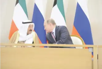  ??  ?? SOCHI: His Highness the Amir Sheikh Sabah Al-Ahmad Al-Jaber Al-Sabah and President Vladimir Putin seen during the signing ceremony. — KUNA