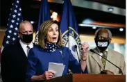  ?? ALYSSA SCHUKAR / THE NEW ?? House Speaker Nancy Pelosi (D-Calif.) addresses the media about extending unemployme­nt benefits in the wake of the coronaviru­s on Friday. Democrats say Republican­s need to “get serious” about a bill.