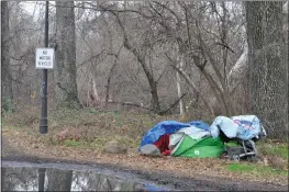  ?? PHOTOS BY JUSTIN COUCHOT — ENTERPRISE-RECORD ?? A campsite is seen Wednesday near One-Mile Recreation Area in Chico on Wednesday after staff of Chico’s Public Works Department asked campers to leave and cleaned up campsites a day earlier.