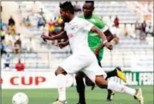  ?? ?? Rangers’ Ugochukwu Ugwuoke (left) is here challenged bye Nasarawa United’s Ismaila Mayoki before the injury that sidelined him since late last year