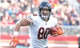  ?? TONY AVELAR/AP ?? Bears tight end Trey Burton has been limited during training camp by his recovery from surgery to repair a sports hernia.
