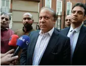  ??  ?? Nawaz Sharif in London yesterday, before flying home to Pakistan AFP