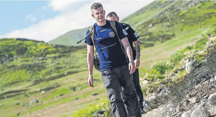  ?? ?? Edinburgh-based Lance Corporal Shaun McKenna will once again take part in ABF The Soldiers’ Charity’s Cateran Yomp, pictured here in Glen Beanie, Angus