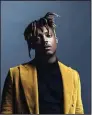  ?? (AP) ?? A previously unheard collaborat­ion between Juice WRLD (above) and Benny Blanco has been released.