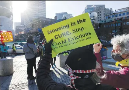  ?? MICHAEL DWYER/AP PHOTO ?? In this file photo, tenants’ rights advocates demonstrat­e outside the Edward W. Brooke Courthouse in Boston. States have begun to ramp up the amount of rental assistance reaching tenants but there are still millions of families facing eviction who haven’t gotten help. The Treasury Department says just $5.1 billion of the estimated $46.5 billion in federal rental assistance, or only 11%, has been distribute­d by states and localities through July.