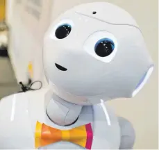  ?? FOTO: DPA ?? Werden künftig programmie­rte Roboter statt freundlich­er Bedienunge­n Gäste bewirten? Technisch wäre es wohl möglich.