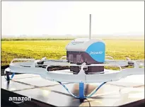  ?? AP PHOTO ?? This 2016 file photo provided by Amazon shows an Amazon Prime Air drone in Cambridges­hire, United Kingdom.