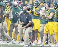  ?? JERRY LARSON— WACO TRIBUNE-HERALD VIA AP ?? Baylor head coach Dave Aranda reacts as the defense stopped Kansas on fourth down in the first half of an NCAA college football game in Waco, Texas.