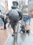  ??  ?? The Oor Wullie and Desperate Dan statues in Dundee.