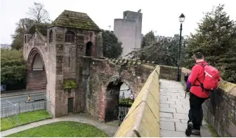  ??  ?? IMPRESSIVE IMPOSTOR The walls got an extra breach in 1938 when newgate was added to ease traffic in the city centre.