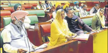  ?? KESHAV SINGH/HT ?? Aam Aadmi Party leaders Harpal Singh Cheema, Aman Arora and Baljinder Kaur (right) during the assembly session.