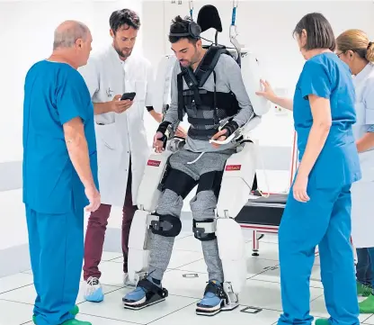  ?? Picture: PA. ?? Medical specialist­s guide Thibault and monitor progress as he gains his first mobility.