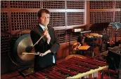  ?? CMW PHOTO STUDIO ?? San Francisco Symphony lead percussion­ist Jacob Nissly is the soloist in a work commission­ed for him, “Losing Earth.”