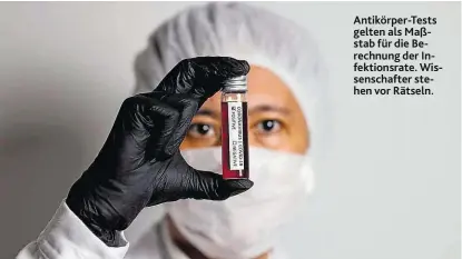  ??  ?? Antikörper-Tests gelten als Maßstab für die Berechnung der Infektions­rate. Wissenscha­fter stehen vor Rätseln.