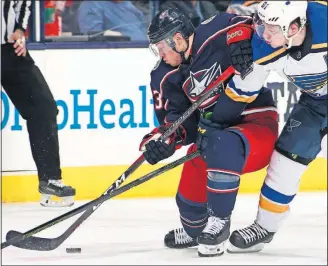  ?? [BROOKE LAVALLEY/DISPATCH] ?? Blue Jackets winger Cam Atkinson, left, has six goals and four assists for the U.S. team entering Thursday’s quarterfin­al against the Czech Republic.