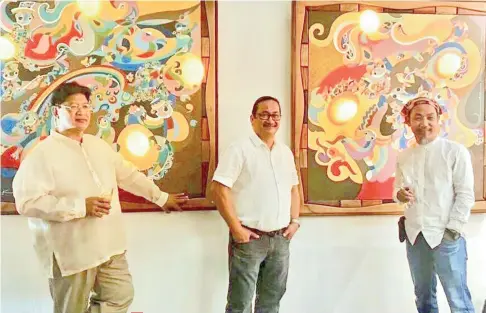  ??  ?? THE THREE ARTISTS. ManilArt curator and egg sculptor Danny Rayos del Sol, wood artist Agi Pagkatipun­an, and Mindanao artist Kublai Millan.