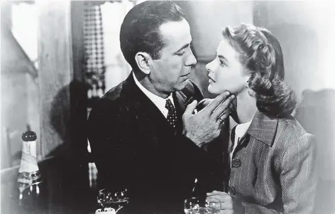  ?? FOTO: DPA ?? Wenn Bilder seufzen könnten: Ingrid Bergman als Ilsa Lund und Humphrey Bogart als Rick in „Casablanca“(1942).