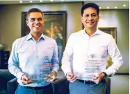  ??  ?? Photo shows Atty. Benjamin M. Gorospe III (left), ICTSI Assistant Corporate Secretary and Global Head of Tax, and Jose Joel M. Sebastian, ICTSI Senior Vice President for Corporate Finance holding the citations received from the City of Manila.
