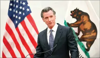  ?? YALONDA M. JAMES / SAN FRANCISCO CHRONICLE VIA AP / FILE ?? California Gov. Gavin Newsom attends a press conference at City Hall on April 26 in San Francisco.