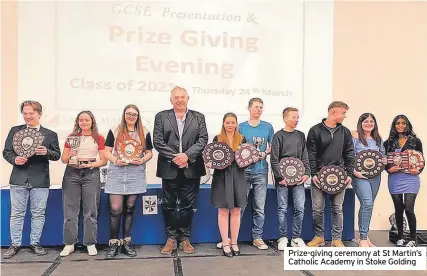  ?? ?? Prize-giving ceremony at St Martin’s Catholic Academy in Stoke Golding