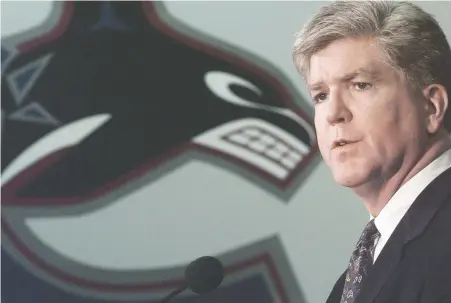  ?? RICK LOUGHRAN/ FILES ?? Brian Burke, then-gm of the Canucks, announces the trade of Pavel Bure to Florida in 1999. Hockey fans can get more insight into Burke's colourful career through his new memoir, Burke's Law: A Life in Hockey, which he wrote along with Stephen Brunt.