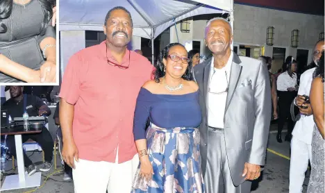  ??  ?? Operators of Grand-A-View Restaurant and Event Place, Carl Erskine (right) and his wife Dr Barbara Erskine, share lens time with his brother George Erskine at the grand opening of their new facility on Queens Drive in Montego Bay last Saturday night.