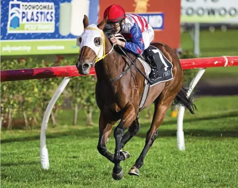  ?? Photo: Nev Madsen ?? GREAT RUN: Magic By Design coasts to an impressive win for Nozi Tomizawa in last night’s Class 1 Handicap at Clifford Park.