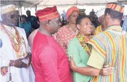  ?? PHOTOS BY OKOYE HENRY ?? Olivia Grange, minister of culture, gender, entertainm­ent and sport, greeting Maroon colonels at Saturday’s celebratio­n.