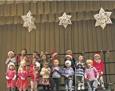  ?? BY CHRISTIE ESTEP ?? Ms. Montague’s students were full of joy and excitement as they sang holiday songs in front of friends and families during the Pre-K performanc­e last Friday.