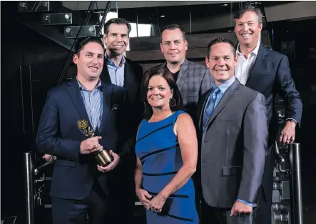  ?? CARDEL LIFESTYLES ?? Cardel sales and marketing manager Brad Logel, vice-president of constructi­on Ryan Dyck, president Tim Logel, business developmen­t manager Brayden Logel and chief financial officer Marie-Anne Prestie are seen with CustomerIn­sight president Christian...