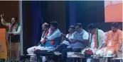  ??  ?? Senior leaders busy with their mobile phones during Delhi BJP in- charge Shyam Jaju’s speech.