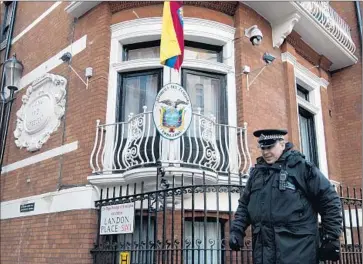  ?? Hannah McKay European Pressphoto Agency ?? THE POLICE PRESENCE at the Ecuadorean Embassy has cost Britain millions since Julian Assange holed up there in June 2012 to avoid extraditio­n to Sweden on sexual assault accusation­s, which he denies.