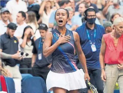  ?? ELISE AMENDOLA THE ASSOCIATED PRESS ?? After her win on Tuesday, Leylah Fernandez called her dad-coach Jorge, who’s at home in Florida with her younger sister.