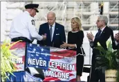  ?? MANUEL BALCE CENETA — THE ASSOCIATED PRESS ?? President Joe Biden, first lady Jill Biden and Attorney General Merrick Garland, right, attend the National Peace Officers' Memorial Service on Sunday at the Capitol in Washington. The event honored law enforcemen­t officers who died on duty in 2021.