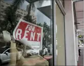  ?? (AP PHOTO/LYNNE SLADKY) ?? In this July 13, 2020 file photo, a For Rent sign hangs on a closed shop during the coronaviru­s pandemic in Miami Beach, Fla. Having endured what was surely a record-shattering slump last quarter, the U.S. economy faces a dim outlook as a resurgent coronaviru­s intensifie­s doubts about the likelihood of any sustained recovery the rest of the year.
