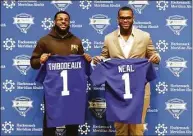  ?? Noah K. Murray / Associated Press ?? New York Giants draft picks Evan Neal and Kayvon Thibodeaux are introduced during a news conference in East Rutherford, N.J., on Saturday.