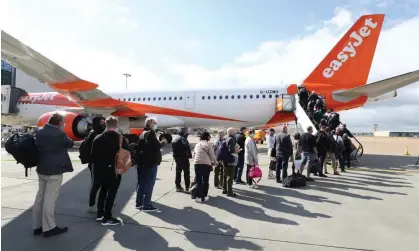  ?? ?? EasyJet said it expects to have fully returned to 2019 capacity levels by next summer. Photograph: Gareth Fuller/PA