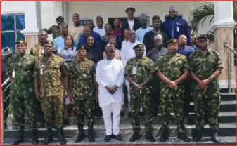  ?? ?? L-R: Commandant, Navy RMAC Training School, Lieutenant Commander Eddy Omokhodion; immediate past WNC Fleet Commander, Commodore Victor Chioji; Commodore Alhassan; Mr Taiwo Olaniran, Head of Maritime Safety and Safer Standard Department, NIMASA; Flag Officer Commanding (FOC) Naval Doctrine Command, Rear Admiral Habilla Zakaria; FOC Western Naval Command, Rear Admiral Mustapha Hassan; and WNC Fleet Commander, Commodore AO Ogunleye with the graduands